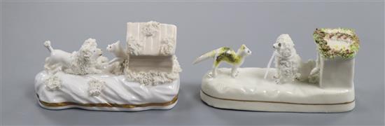 Two rare Staffordshire porcelain kennel groups of a cat confronting a dog, c.1835-50, L. 11.5cm and 12.3cm